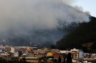 Winds from Storm Ciarán whip up a wildfire in eastern Spain as 850 people are evacuated