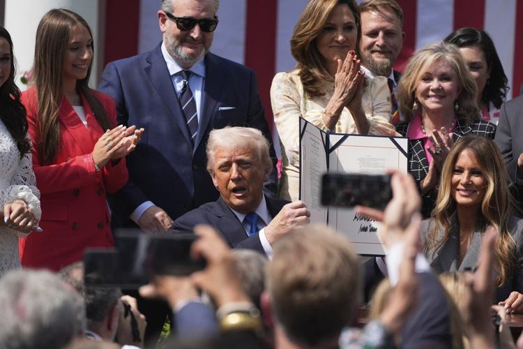 Trump signs a bill to make posting 'revenge porn' a federal crime. He had the first lady sign, too