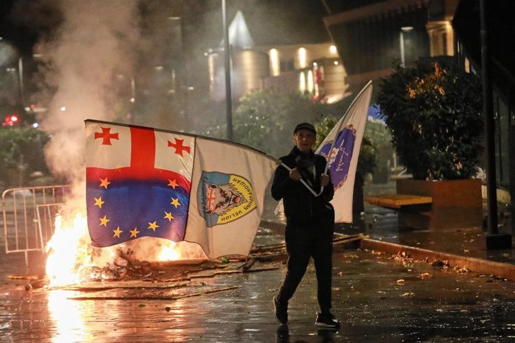 Georgia's ruling party claims landslide win in local vote boycotted by main opposition