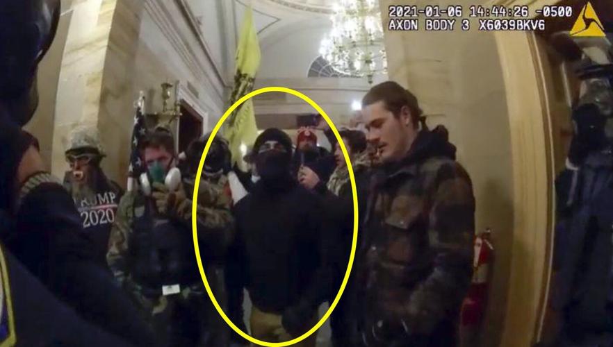 Ex-police officer and Proud Boys member gets 14 months in prison for joining Capitol attack