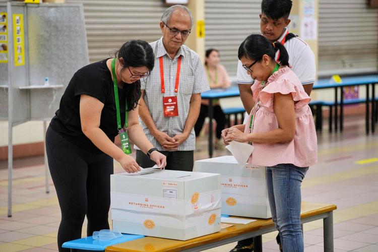 Voting closes in Singapore as its long-ruling party seeks a bigger win
