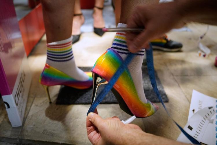 People race through Madrid in high heels during Pride, in photos