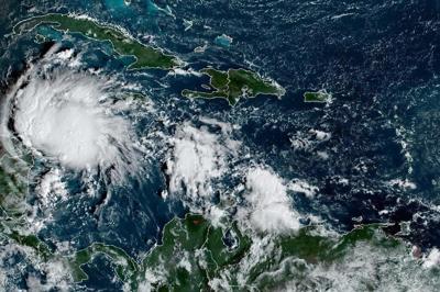 Tropical Depression Lisa crosses into southern Mexico