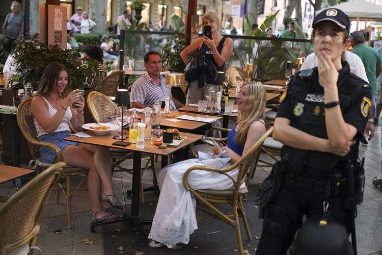 Spaniards turn water pistols on visitors in Barcelona and Mallorca to protest mass tourism