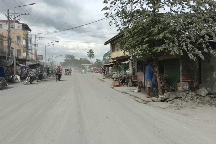 Mass evacuation of Philippine villages underway after a brief but major volcanic eruption