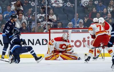 Niederreiter scores twice for Jets in 5-2 pre-season win over Flames