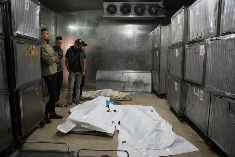 An Israeli strike hits a Gaza City apartment, killing 2 children, Palestinian health officials say
