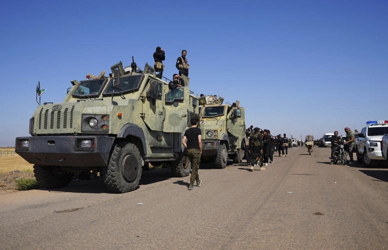 Israel strikes military tanks in southern Syria, where government forces clash with Druze militias