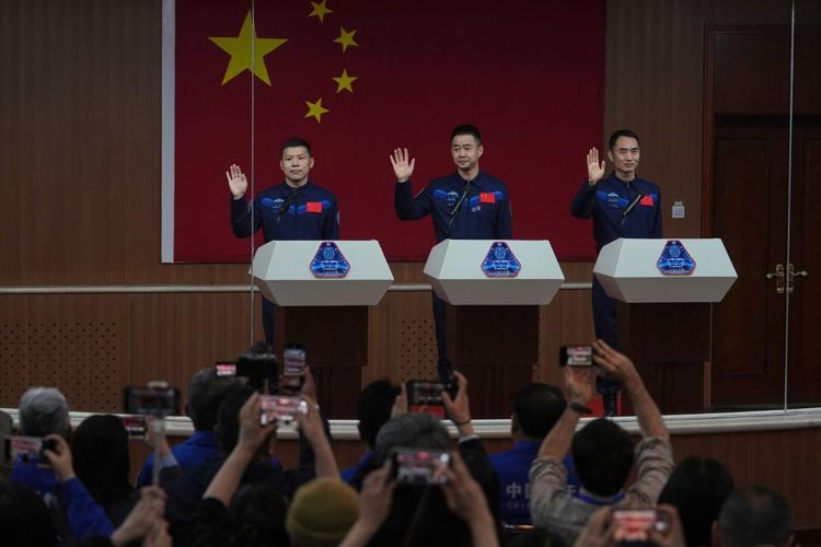 China's stranded astronauts 'in good condition' after space debris delays planned return
