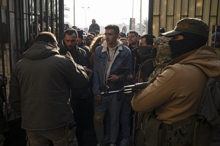 Syrian soldiers distance themselves from Assad in return for promised amnesty
