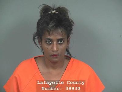 Woman charged with repeatedly poisoning husband