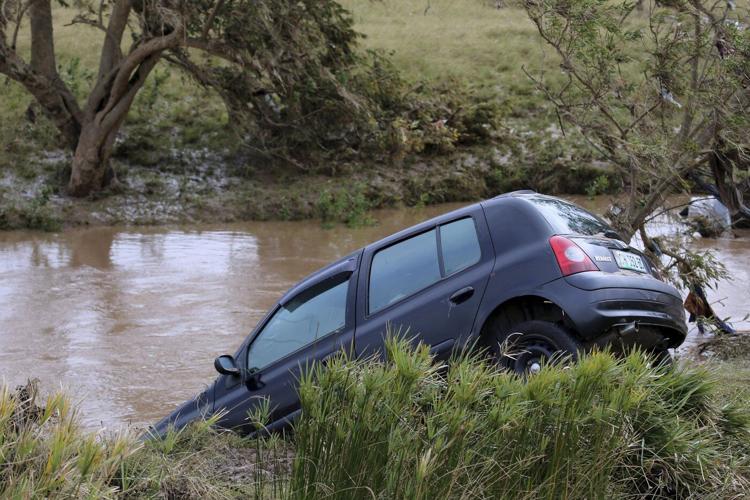 Rescuers in South Africa search for the missing after floods as the death toll rises to 57