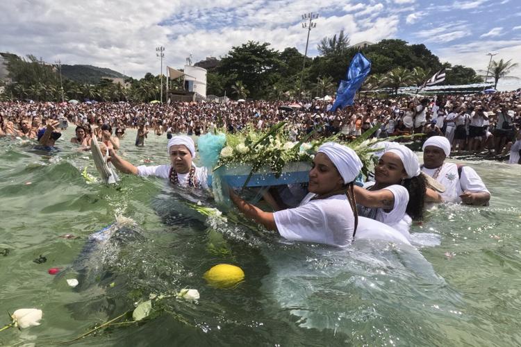 Devotees pay homage to Afro-Brazilian sea goddess on Rio de Janeiro beach