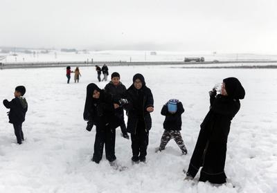 Late snowstorms batter South Africa's coast and leave 2 people dead