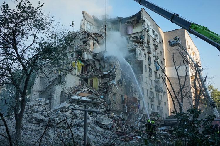 Photos show aftermath of large-scale Russian attack overnight in Kyiv