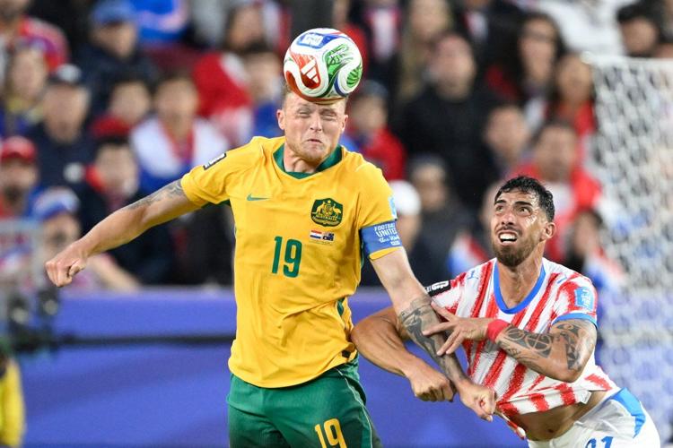Australia clinches knockout round spot with 0-0 draw; Paraguay also likely to advance