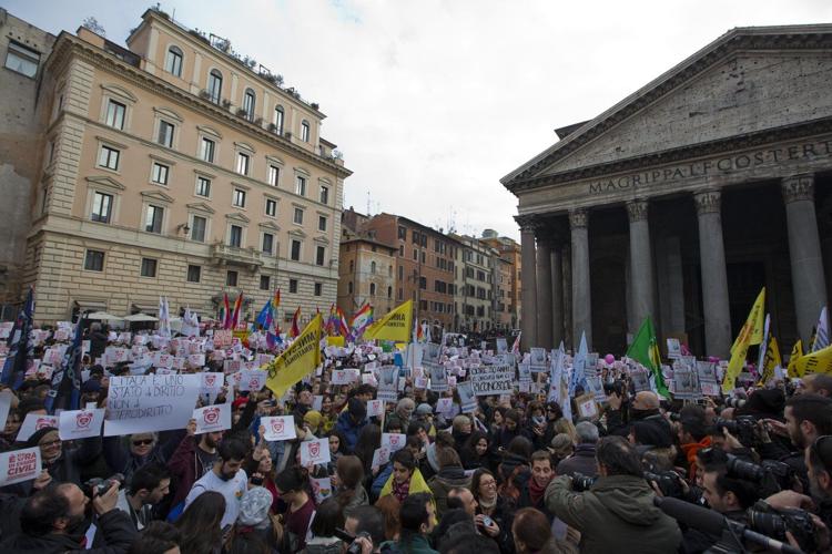 Italy constitutional court says non-biological mother in same-sex union entitled to paternity leave