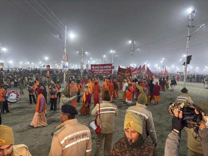 Naked, ash-smeared Hindu ascetics take holy dips at the Maha Kumbh festival