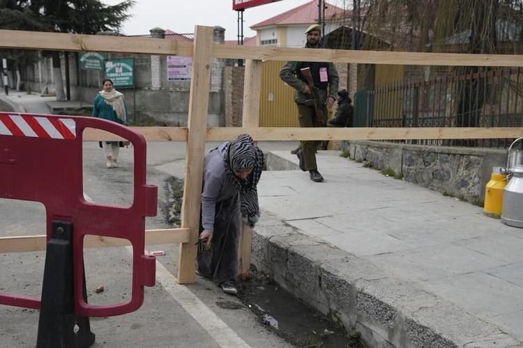 Modi visits Kashmir's main city for the first time since revoking region's semi-autonomy