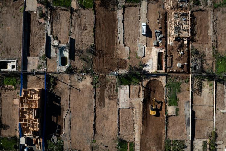 A year after LA-area wildfires destroyed thousands of homes, fewer than a dozen have been rebuilt
