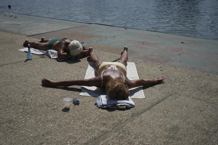 Parts of Europe burn as millions are facing record heat