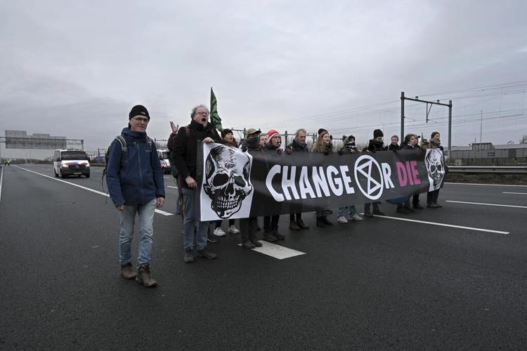 Climate activists from Extinction Rebellion have blocked part of the highway around Amsterdam
