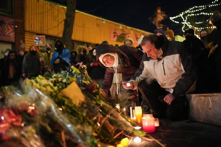 From frigid quiet to outraged sorrow, a few hours on Minneapolis street where agents killed man