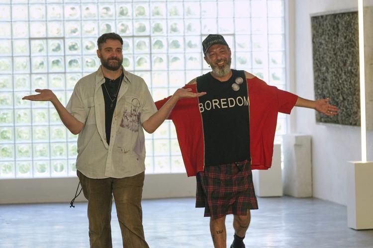 Simon Cracker creates a brand uniform to highlight star upcycled garments during Milan Fashion Week