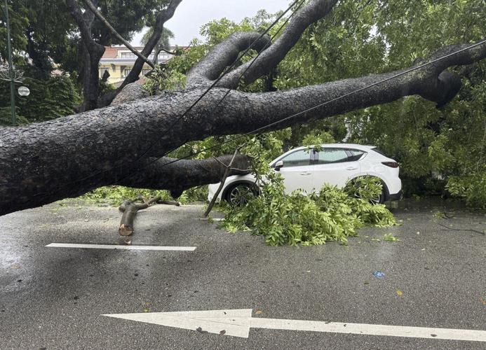 Tropical storm leaves 3 dead in Vietnam and brings heavy rain to parts of Southeast Asia