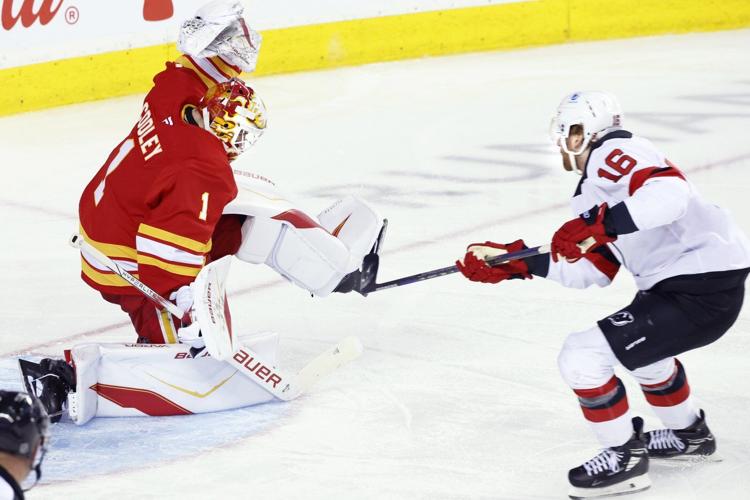 Nemec scores in OT as Devils douse Flames 2-1