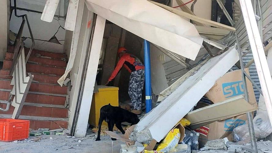A 7.8 magnitude quake in the Philippines kills at least 32, fells buildings and sets off a tsunami