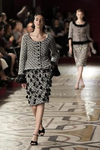 Chanel goes to the opera in a gleaming but designer-less couture collection