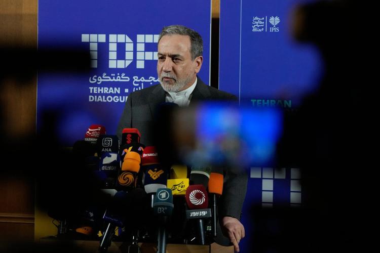 Iran's foreign minister says the nation is no longer enriching uranium at any site in the country