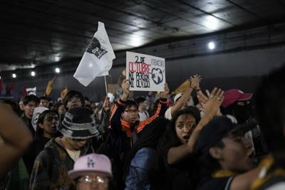 Generations of students remember 1968 massacre in march through Mexico City