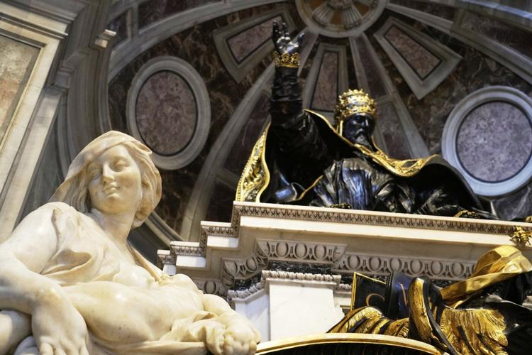 Pope makes another surprise appearance at St. Peter's, greeting restorers of papal tombs