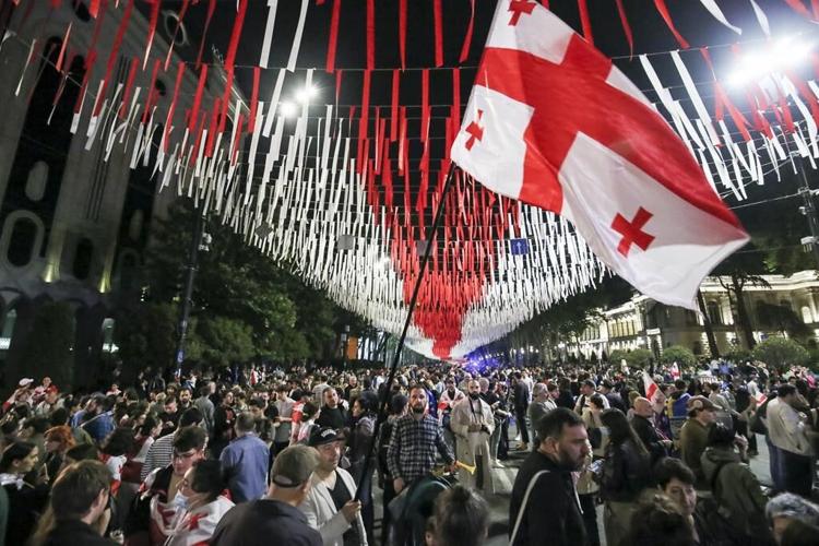 Parliament speaker in Georgia signs into law a bill that critics say curbs media freedom