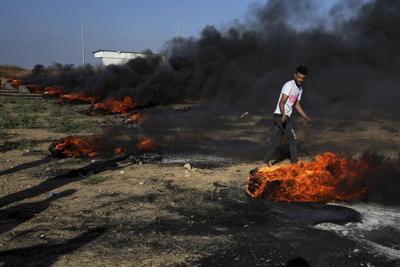Israeli military raid kills 3 in West Bank. Officials say 4th man killed by Israeli fire in Gaza