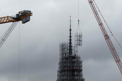 Notre Dame cathedral's spire revealed in Paris as reconstruction continues after fire