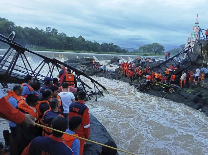 2 killed and 32 injured after a bridge collapses at a tourist destination in western India