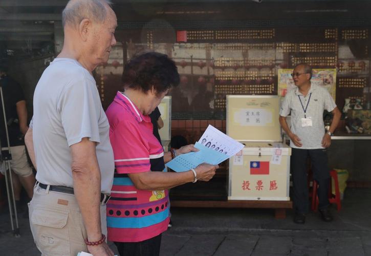 Taiwan's main opposition party elects new leader in a race clouded by claims of China meddling