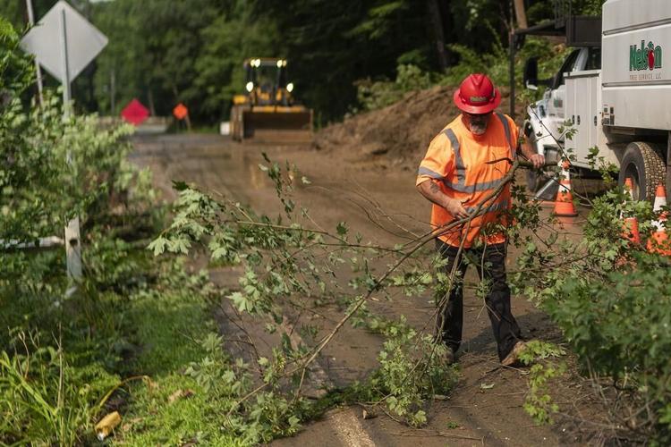 Floods wash away children, scorching heat envelops the West as wildfire smoke overtakes northern US