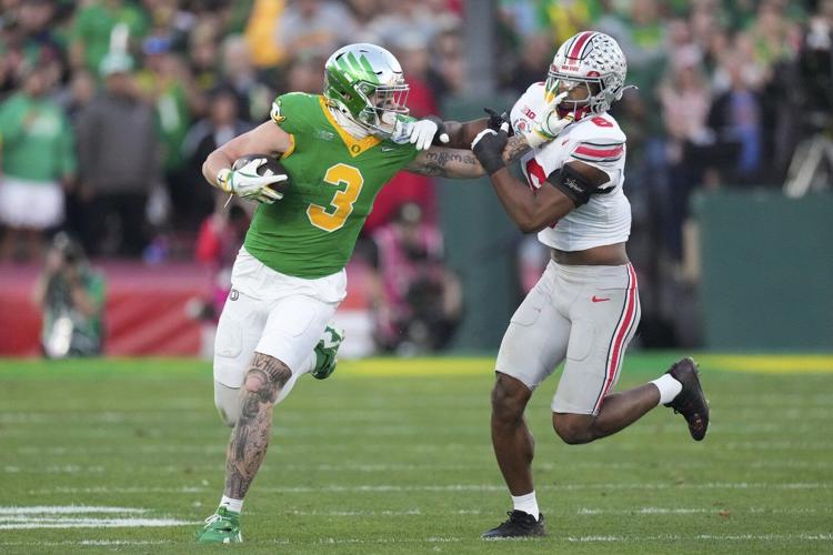 No. 6 Ohio State blasts top-ranked Oregon 41-21 in the Rose Bowl, advances to CFP semifinals