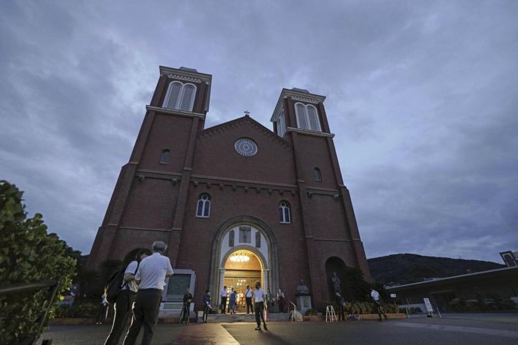 Nagasaki cathedral blesses a bell that replaces one destroyed by the US atomic bomb