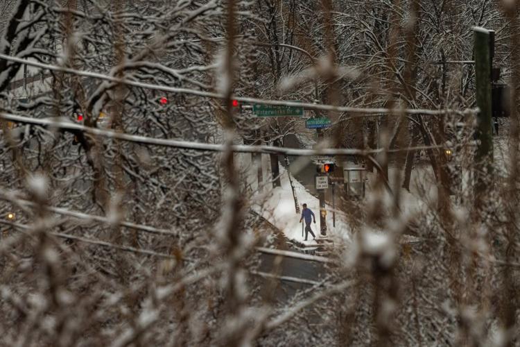 Eastern storm cuts power to tens of thousands as California braces for flooding