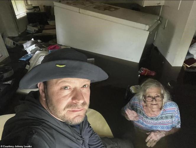 Son's images show him rescuing Mom from Ian's floodwaters