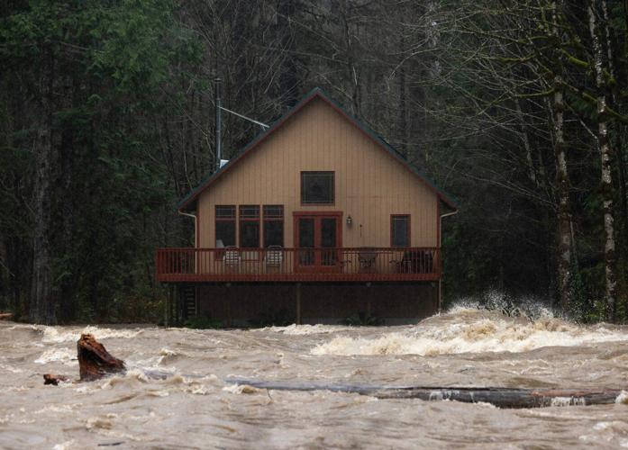 Tens of thousands in Washington could face evacuations as rain continues to pound the region