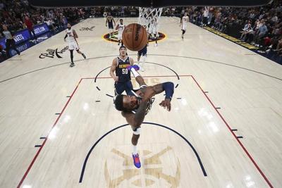 Nuggets disappear in second half against Heat, suffer first home loss since March 30