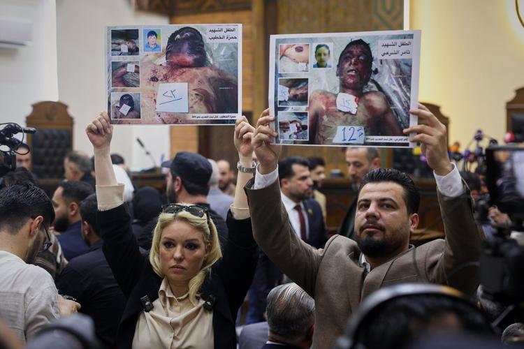 Syria’s first public trial of Assad-era officials opens in Damascus