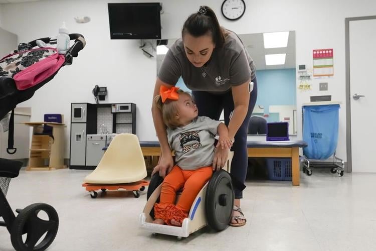 Custom made by Tulane students, mobility chairs help special needs toddlers get moving