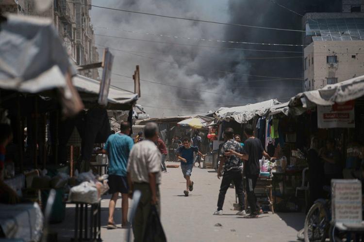 AP PHOTOS: An AP photographer captures the moment an Israeli airstrike slammed into Gaza City